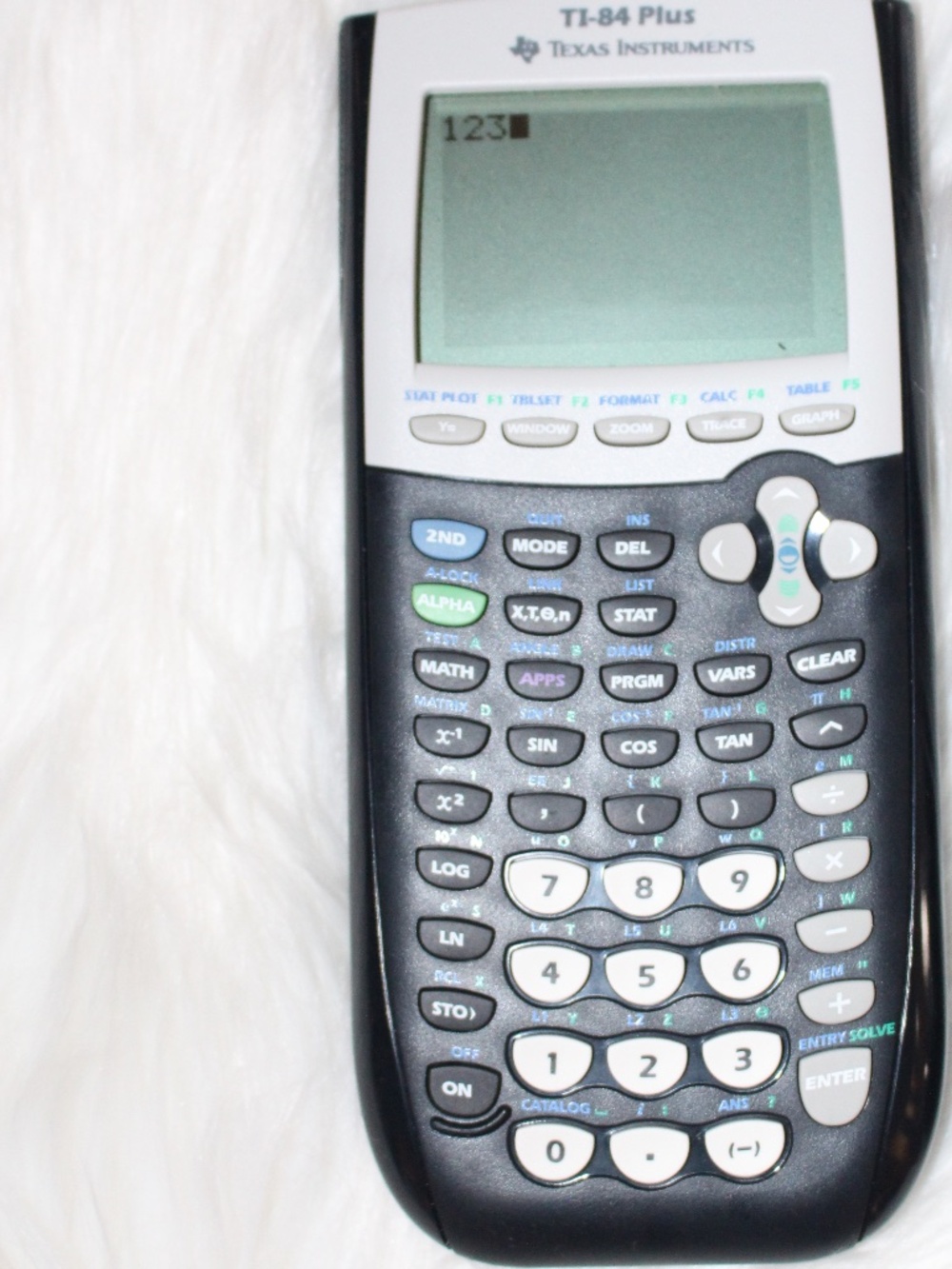 Texas Instruments TI-84 Plus Graphing Calculator in Black and White